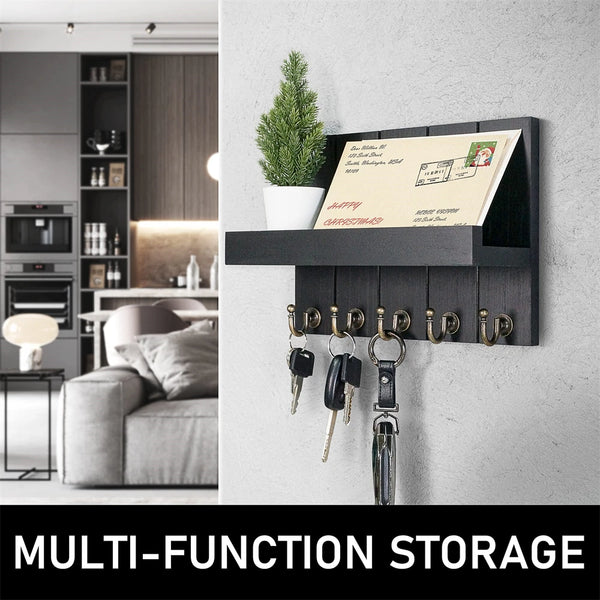 Rustic wooden wall-mounted organizer for mail and keys featuring five hooks mounted on a gray wall.