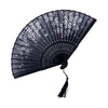 Black vintage bamboo folding fan decorated with white floral patterns