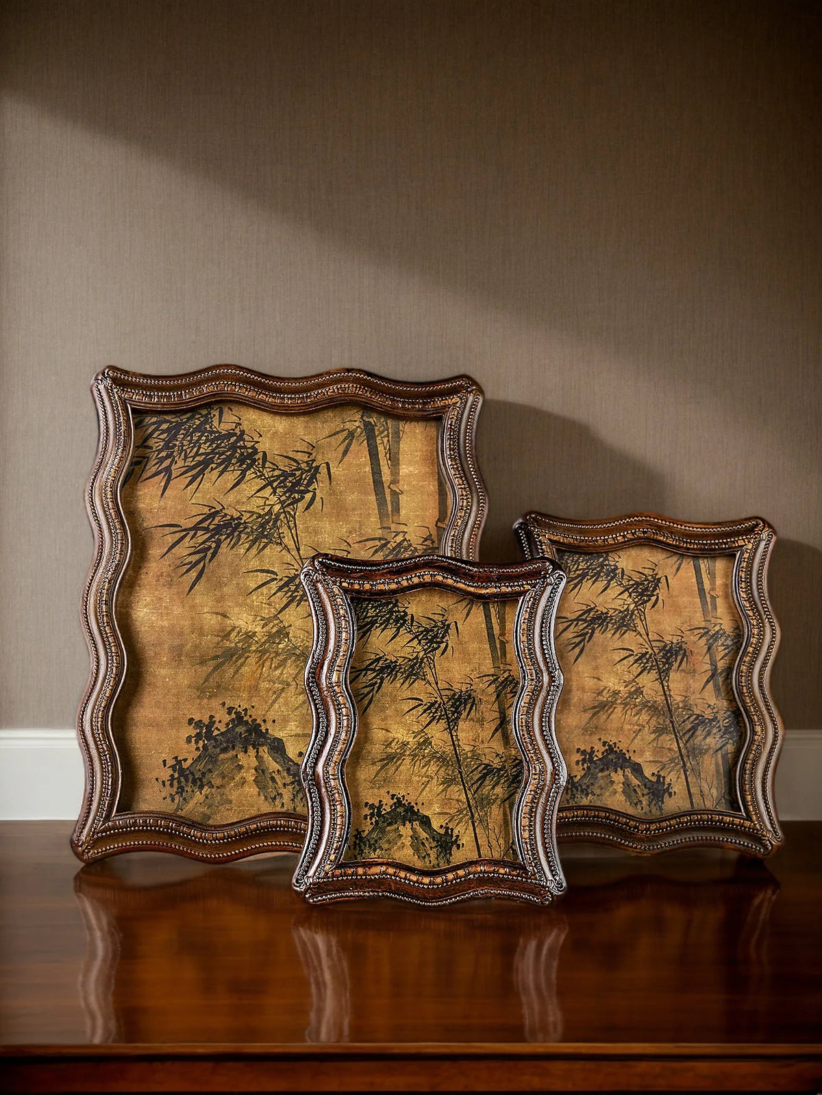 A vintage resin photo frame decor featuring a dark, textured background with silhouettes of bamboo against a gold-toned frame