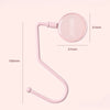 A pink heavy duty purse and bag hook with a curved arm and circular hook, shown against a light background.