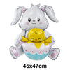A white bunny foil balloon holding a yellow chick foil balloon.