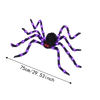 An LED light-up furry Halloween spider decoration with a purple glow.