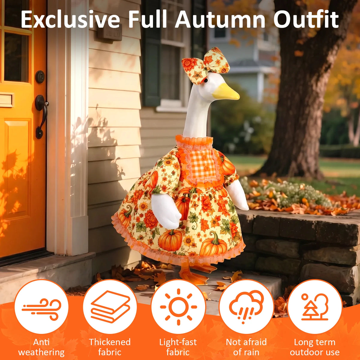 A white goose costume dress with an orange floral pattern and matching bow displayed outdoors.