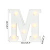 A white alphabet letter M light with warm white LED illumination