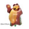 A golden bear inflatable decoration with a face and arms, used for party decor.