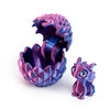 A purple dragon egg is cracked open, revealing a small, purple dragon toy inside.