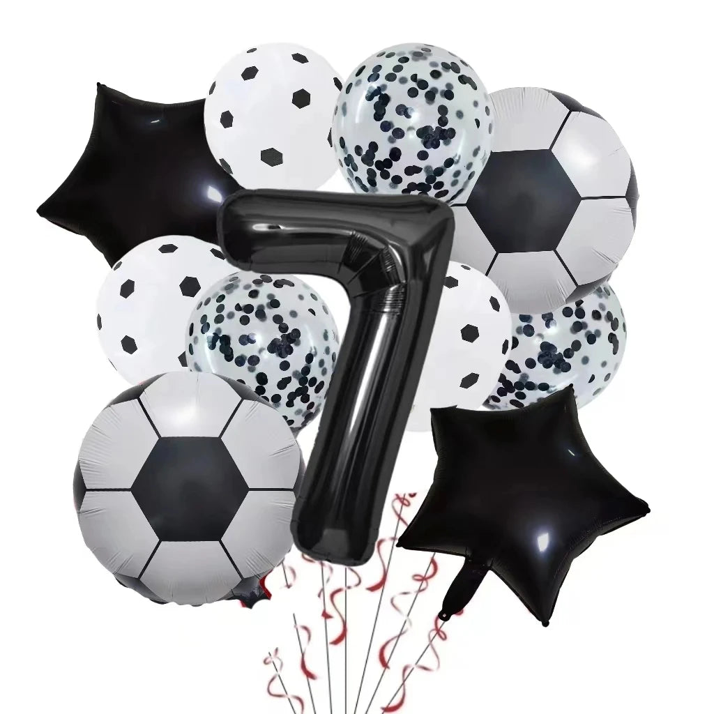 A set of black and white patterned football shaped helium foil balloons and a large number seven balloon for party decoration
