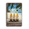 A vintage beer metal sign set featuring three Corona Extra signs set against a tropical beach background.