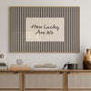 Black and white striped canvas wall art featuring the text How Lucky Are We