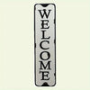 A vertical vintage metal street sign with the word WELCOME carved into it.