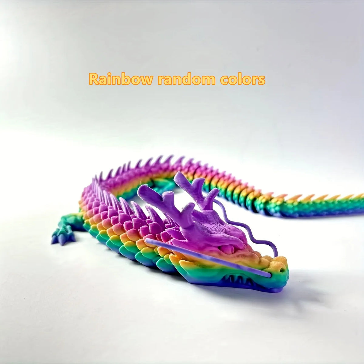 Rainbow random colors articulated 3D printed dragon figurine with vibrant iridescent scales