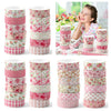 A set of 12 rolls of retro floral washi tape in pink and green patterns for crafting and gift wrapping.