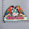 A colorful wooden fridge magnet featuring a toucan bird and tropical leaves with the text PUNTA CANA