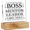 A clear acrylic plaque with text appreciating a boss, mentor, and leader.
