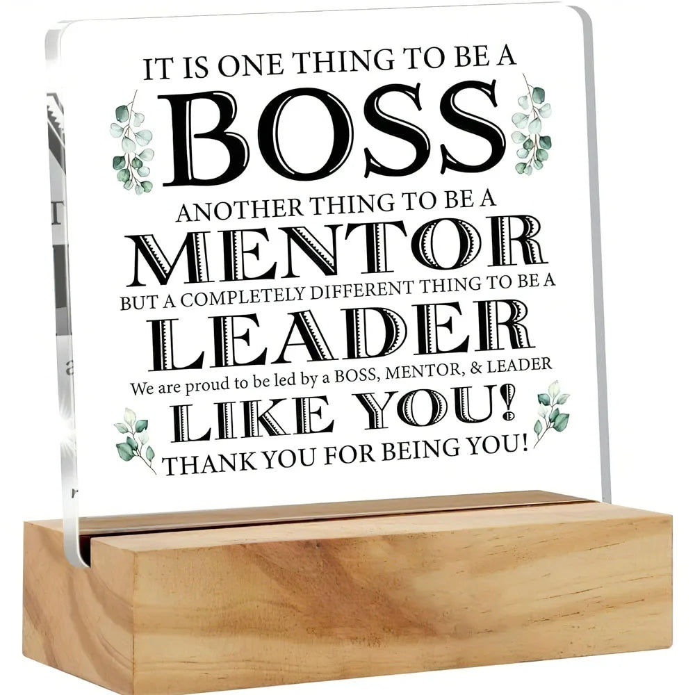 A clear acrylic plaque with text appreciating a boss, mentor, and leader.