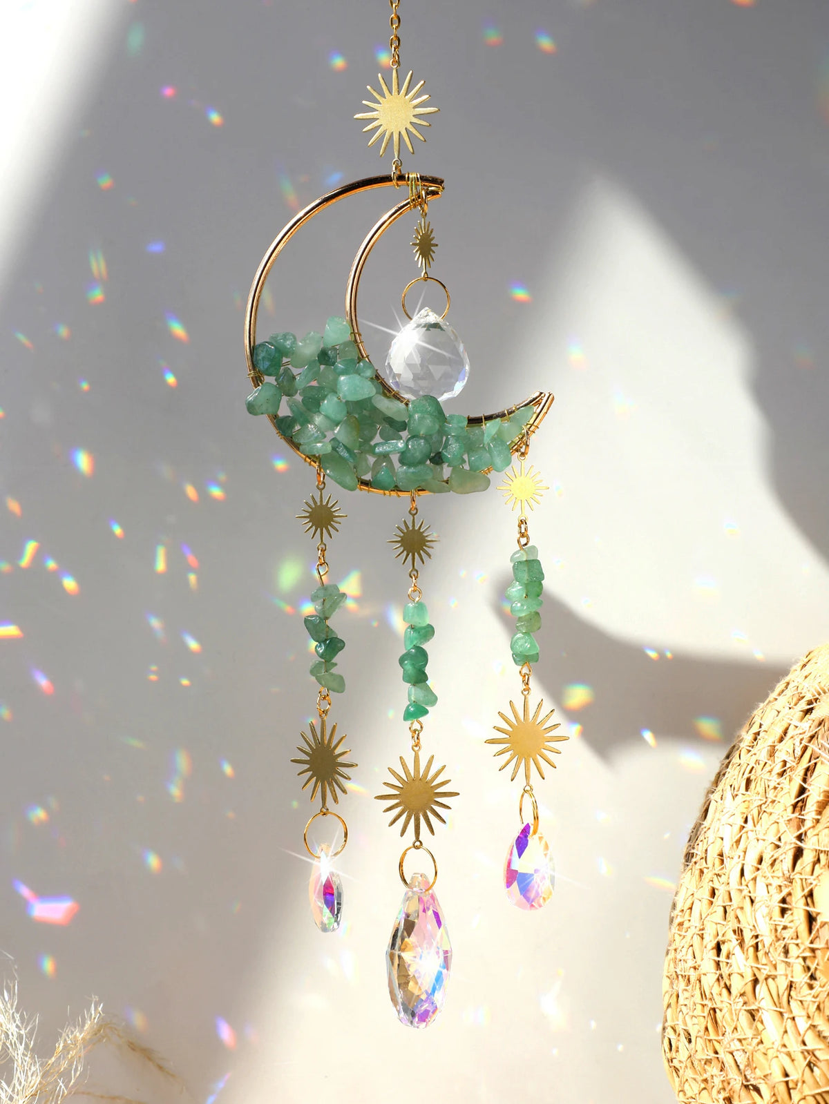 Handcrafted moon crystal suncatcher featuring a crescent moon and prism pendant with dangling crystals.