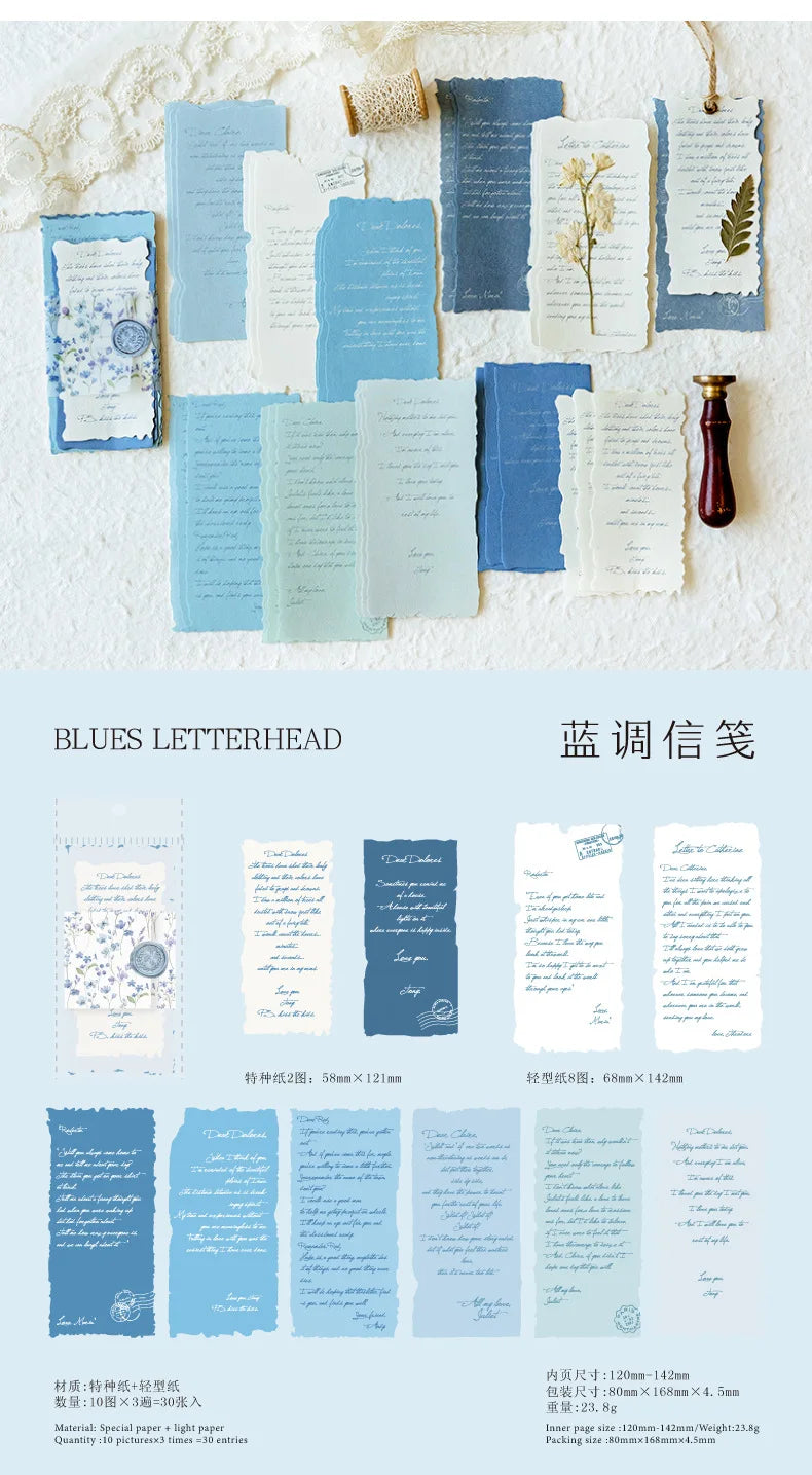 A set of blue letterhead paper featuring vintage old English manuscript designs and decorative elements.