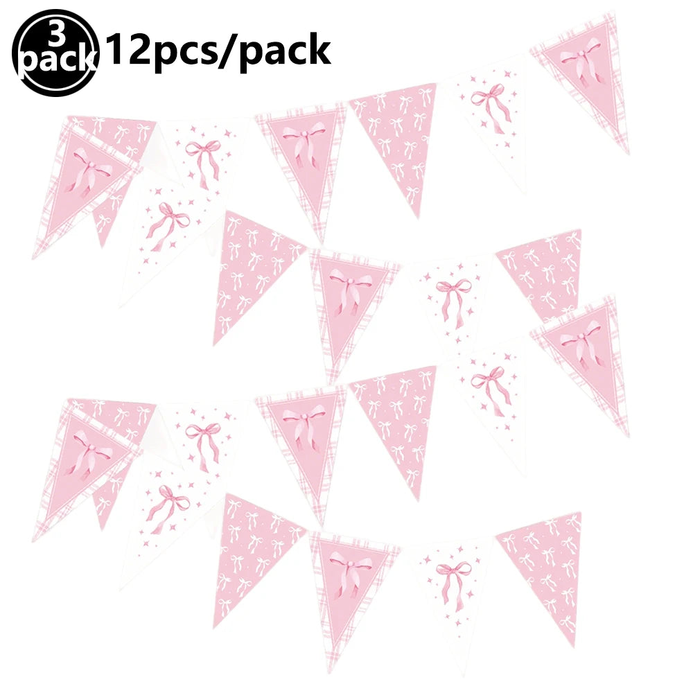 A set of 12 pink triangular flags with bows for a birthday party decoration.
