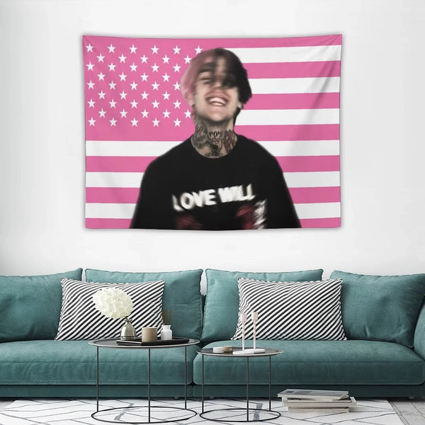 A pink and white American flag tapestry featuring a person's portrait with a beard and a black shirt that reads Love Will