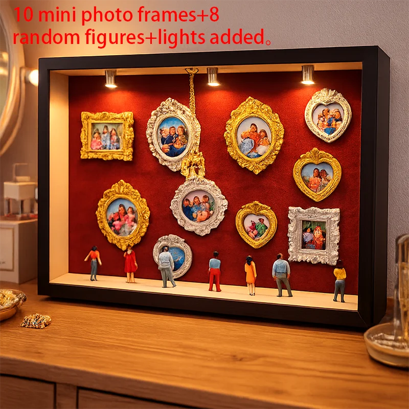 Schwarze Displaybox gefüllt mit zehn Fotorahmen und acht Figuren mit Lichtern.