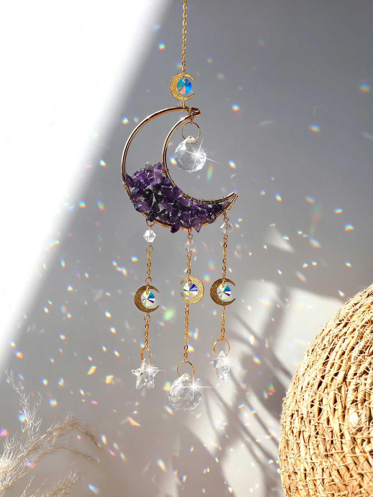 Handcrafted moon crystal suncatcher featuring a purple crescent pendant and gold prism charms.