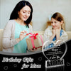 Acrylic heart plaque for mom gift featuring a woman and a girl looking at a wrapped present