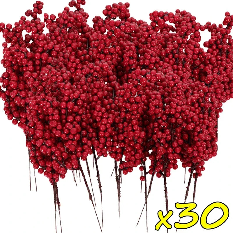 A dense cluster of artificial red holly berry stems used for Christmas decoration.