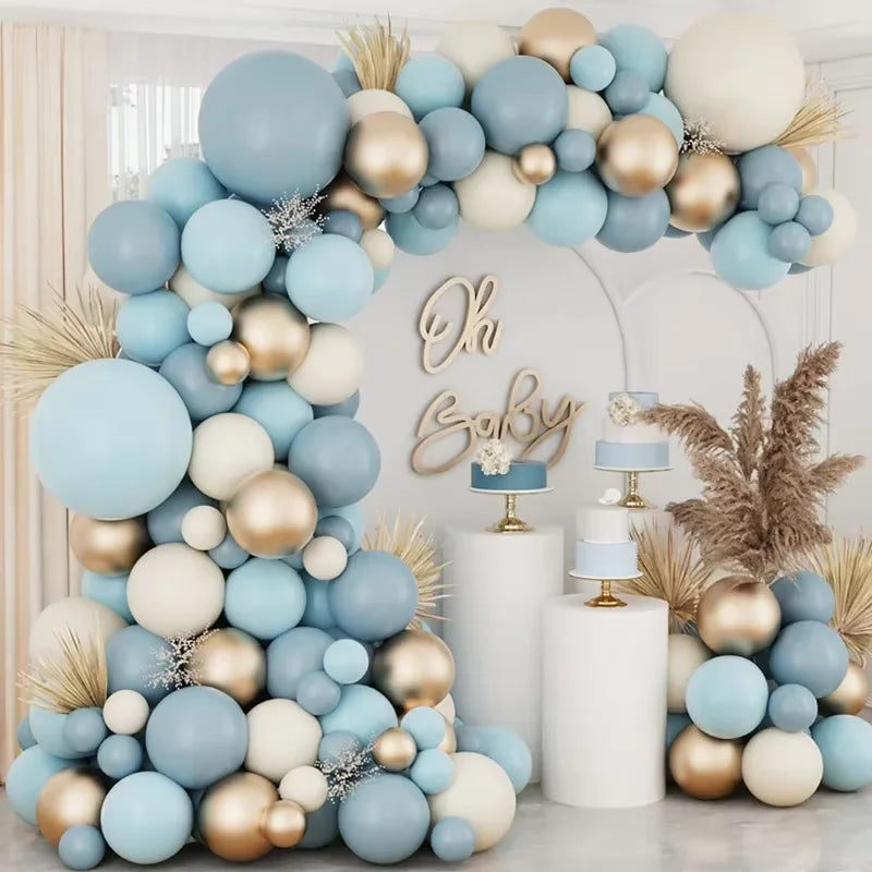 A blue and gold balloon garland arch kit featuring various sized balloons arranged for a party decoration.