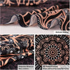 Close-up of a black and orange patterned fabric featuring intricate line art, showcasing delicate sewing and HD digital print
