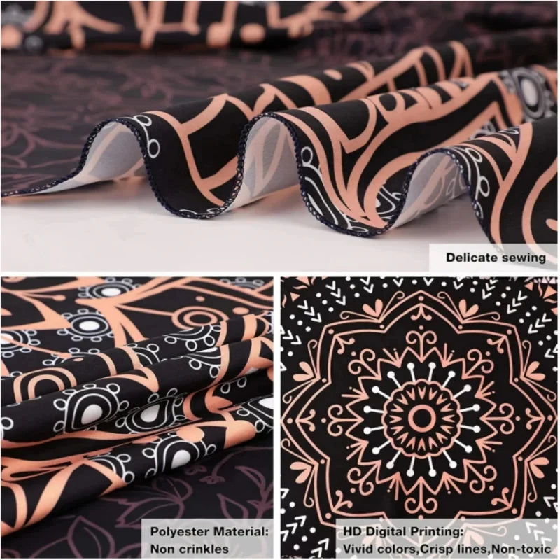 Close-up of a black and orange patterned fabric featuring intricate line art, showcasing delicate sewing and HD digital print