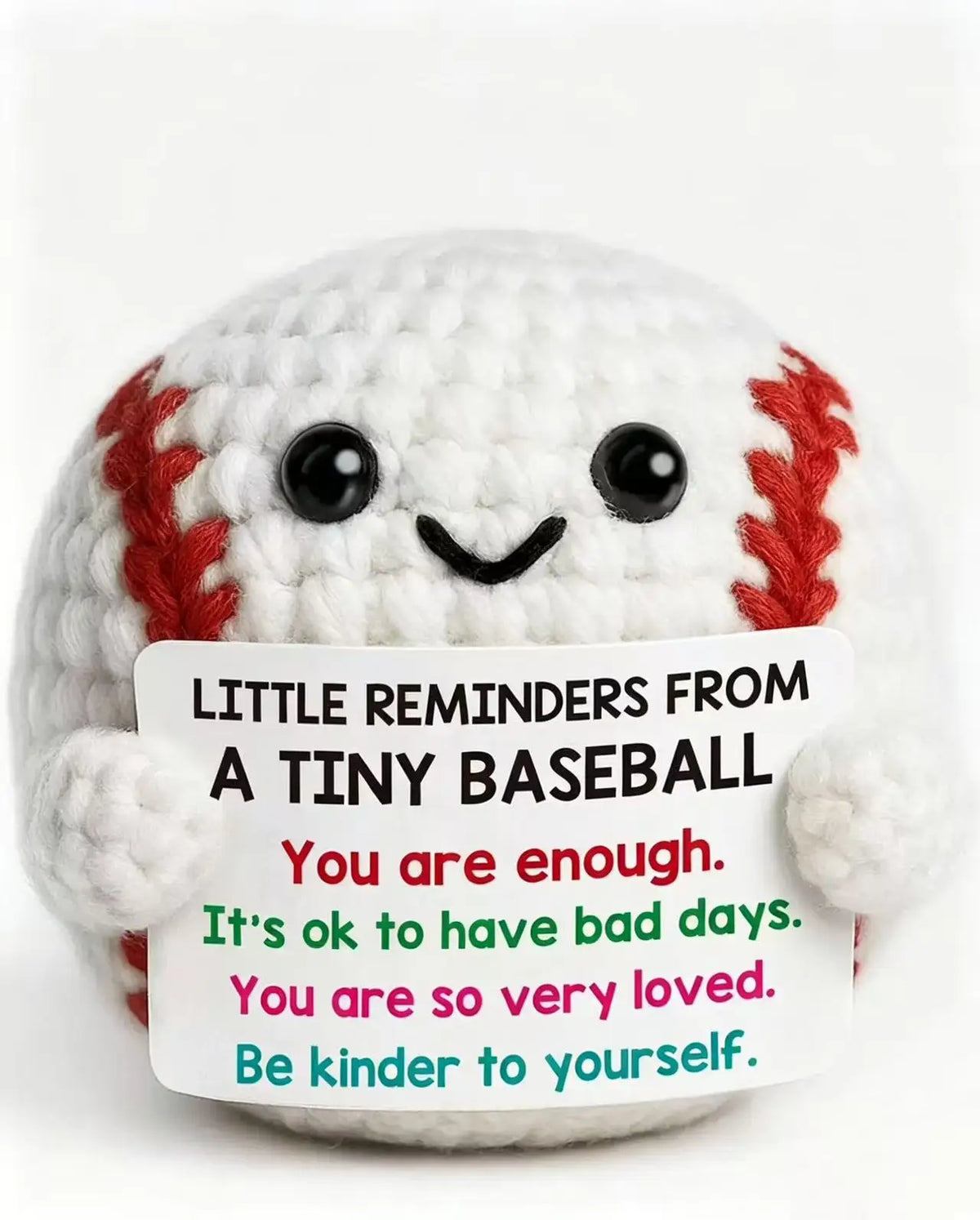 Handmade crochet baseball bat doll with a positivity card featuring messages like You are enough and You are so very loved.