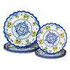 A stack of blue and white floral disposable paper plates featuring blue and yellow lemon designs.