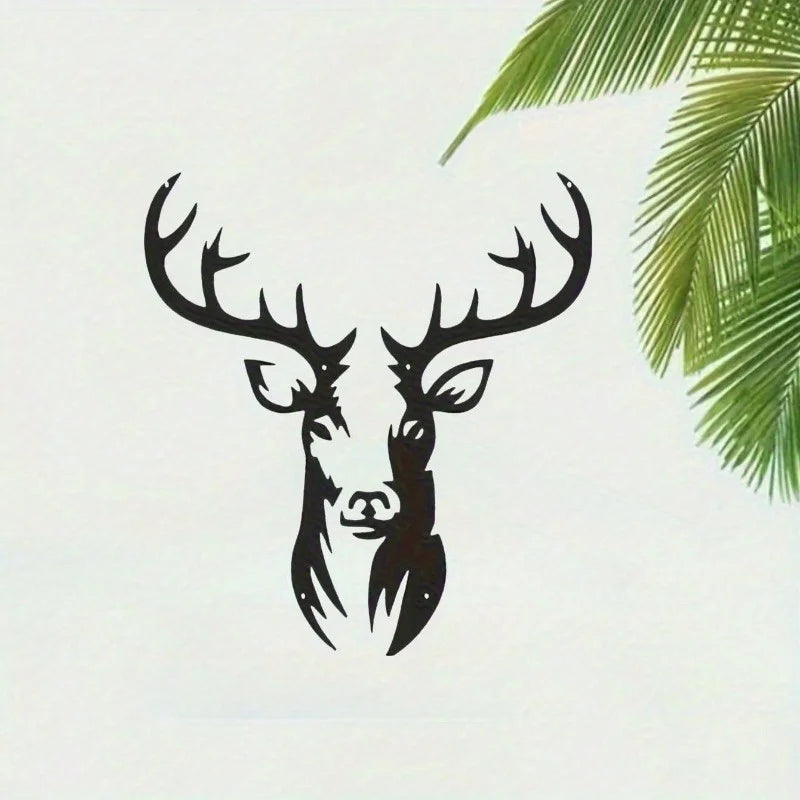 Black metal wall sculpture of a deer head with antlers and facial features.