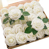 A box filled with white artificial rose flowers on a wooden surface.