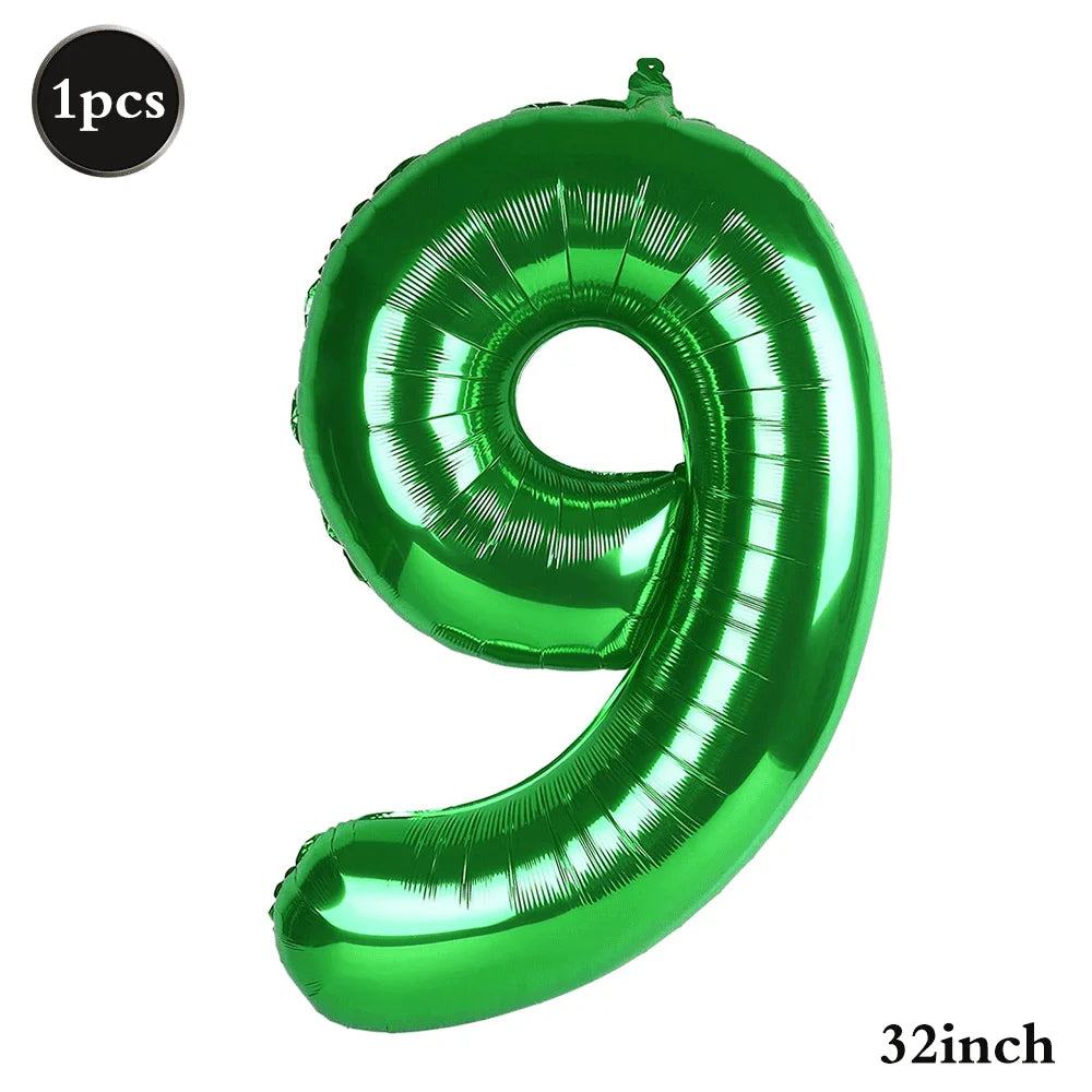 A shiny green foil number balloon shaped like the numeral 9, measuring 32 inches.
