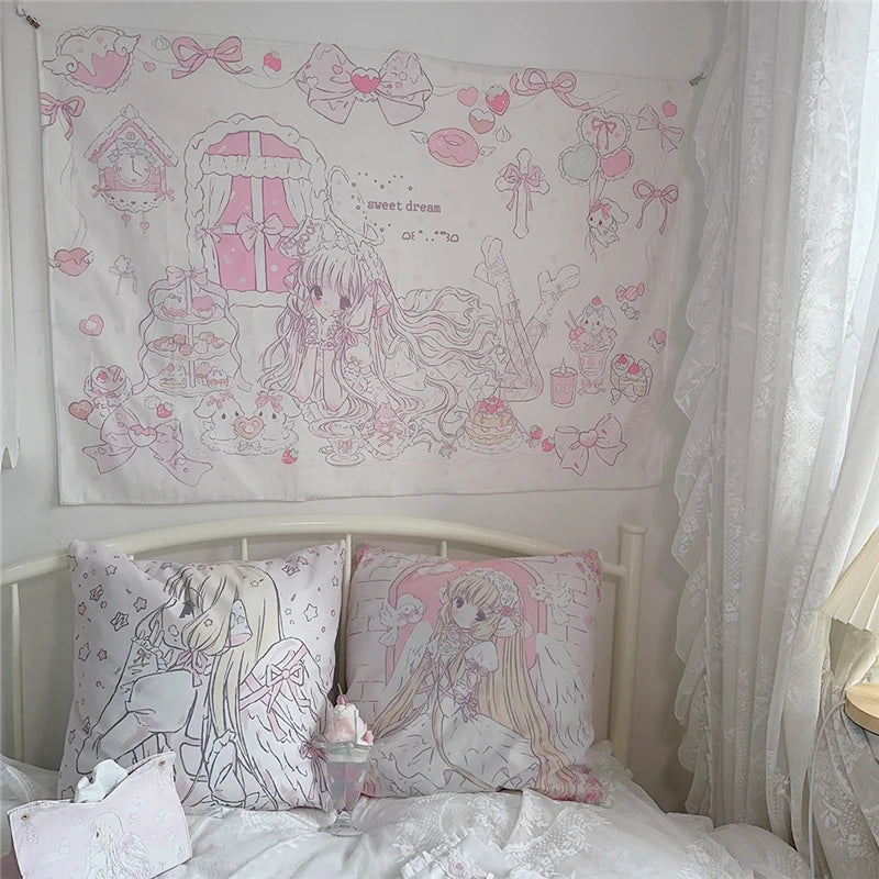 A pink and white kawaii cartoon tapestry wall hanging featuring sweet dreams and cute characters above a bed.