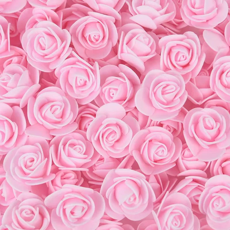 A dense bulk pack of realistic pink foam rose flowers for weddings and events.