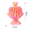 A bouquet of pink heart-shaped balloons with a foil finish, displayed against a white background.
