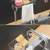 Faucet-mounted kitchen organizer holding a sponge, a block of yellow soap, and a white towel for dish cleaning.