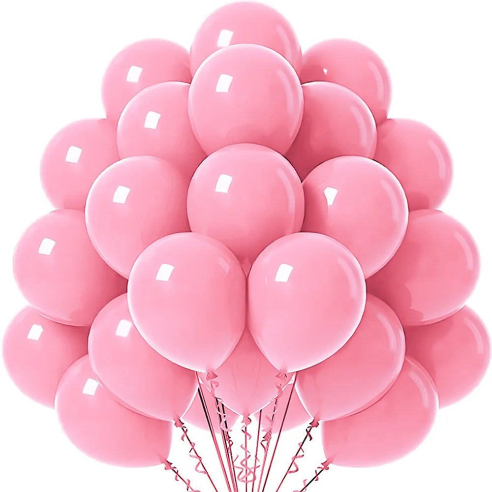 A bunch of pink latex balloons tied together for party décor