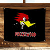 A black flag featuring a stylized red and yellow rooster head with the name Peckerwood printed below.