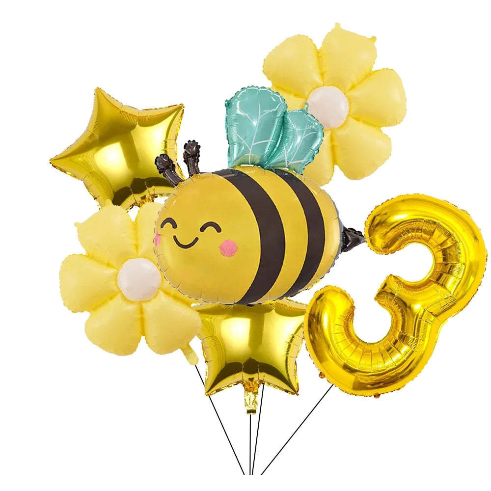 A set of six yellow and light green aluminum foil daisy balloons shaped like a bee and the number seven.