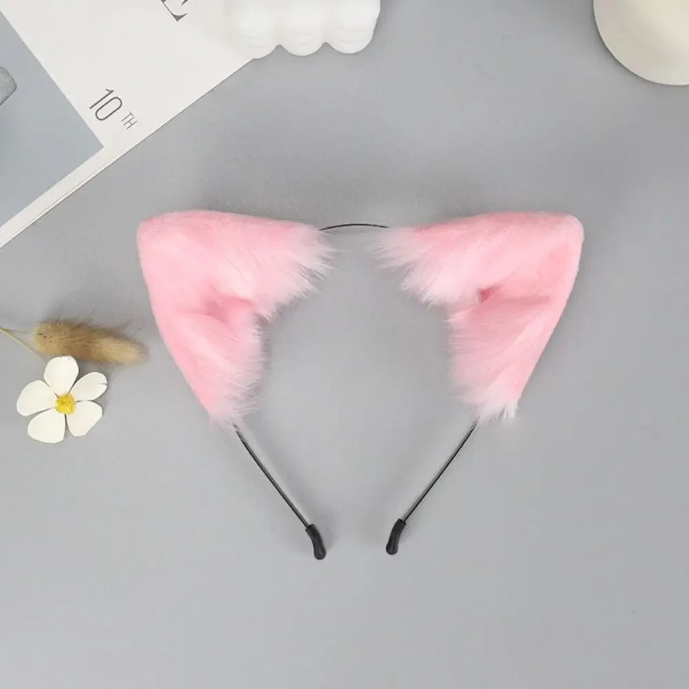 Pink plush fox ears headband with black nose bridge and dangling ears