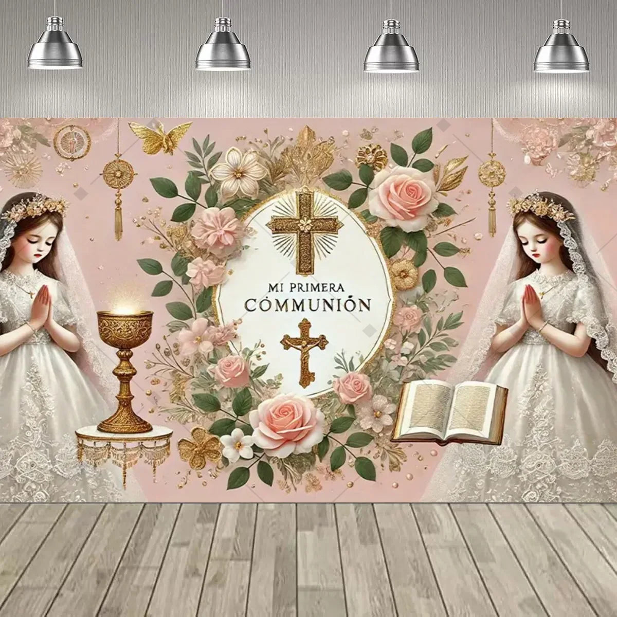 A soft pink First Communion backdrop featuring floral designs, a cross, and two girls in white dresses.
