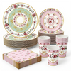 A set of vintage floral paper tableware including plates, cups, and napkins in pink, green, and gold tones.