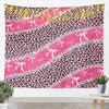 Pink and black leopard print tapestry wall hanging featuring a wild animal pattern.