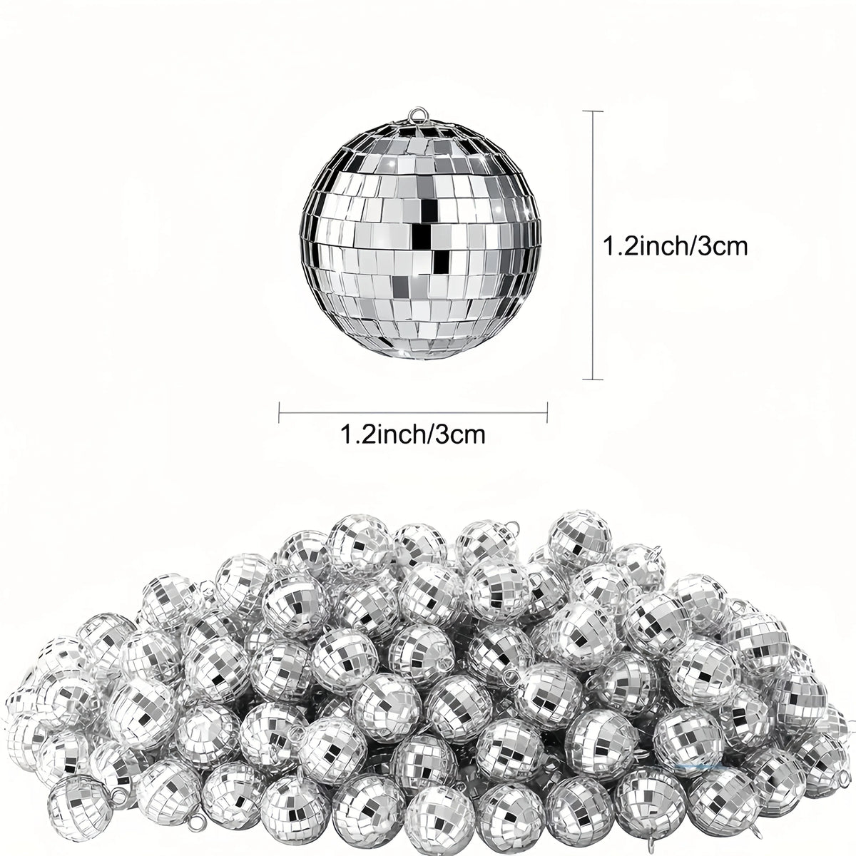 A pile of silver disco mirror balls used for party decor.