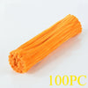 A bundle of orange chenille stem pipe cleaners for DIY crafts.
