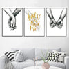 Three black and white line art prints depicting hands joined together