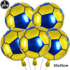 Five yellow and blue inflatable soccer balls used for party decoration